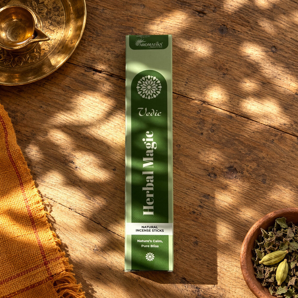 Aromatika Vedic Herbal Magic natural incense sticks in green packaging on a bohemian Ayurveda inspired wooden surface
