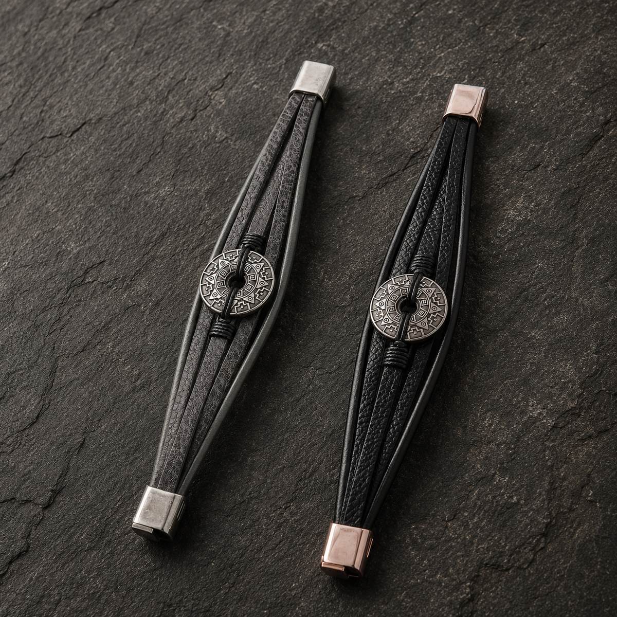 Black and grey multi-strand bracelets with silver-tone geometric disc centerpiece.
