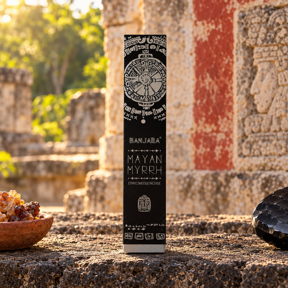 Banjara Mayan Myrrh Ethno Smudge incense box displayed outdoors beside myrrh resin and dark stone.