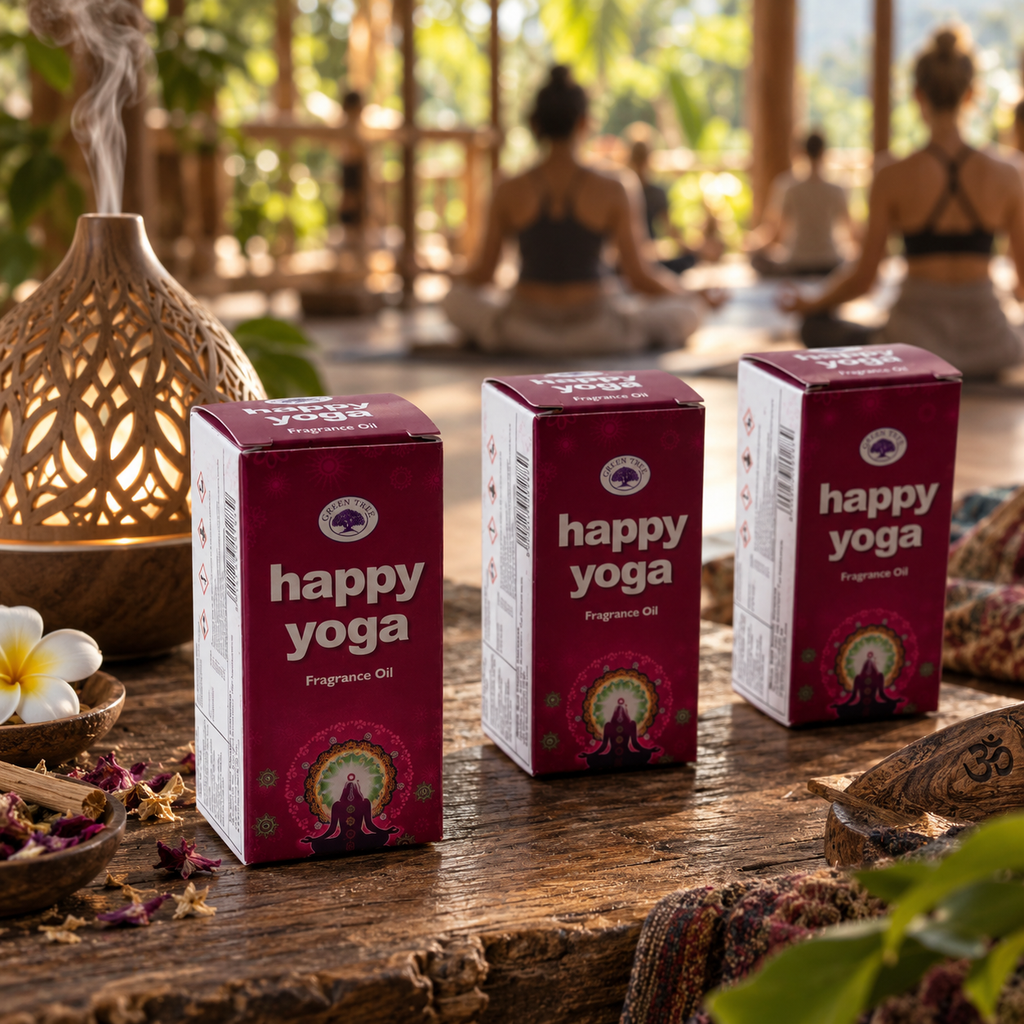 Green Tree Happy Yoga Fragrance Oil boxes displayed in a warm yoga and meditation studio setting