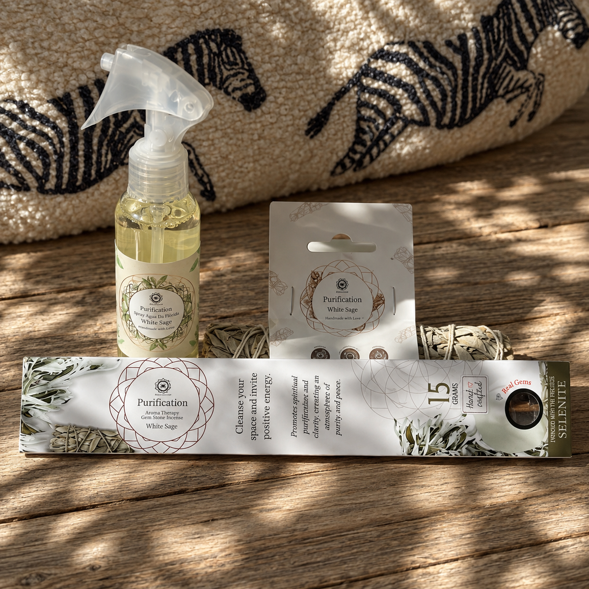 White sage purification products including Florida Water Spray, natural smudge stick and White Sage Selenite incense.